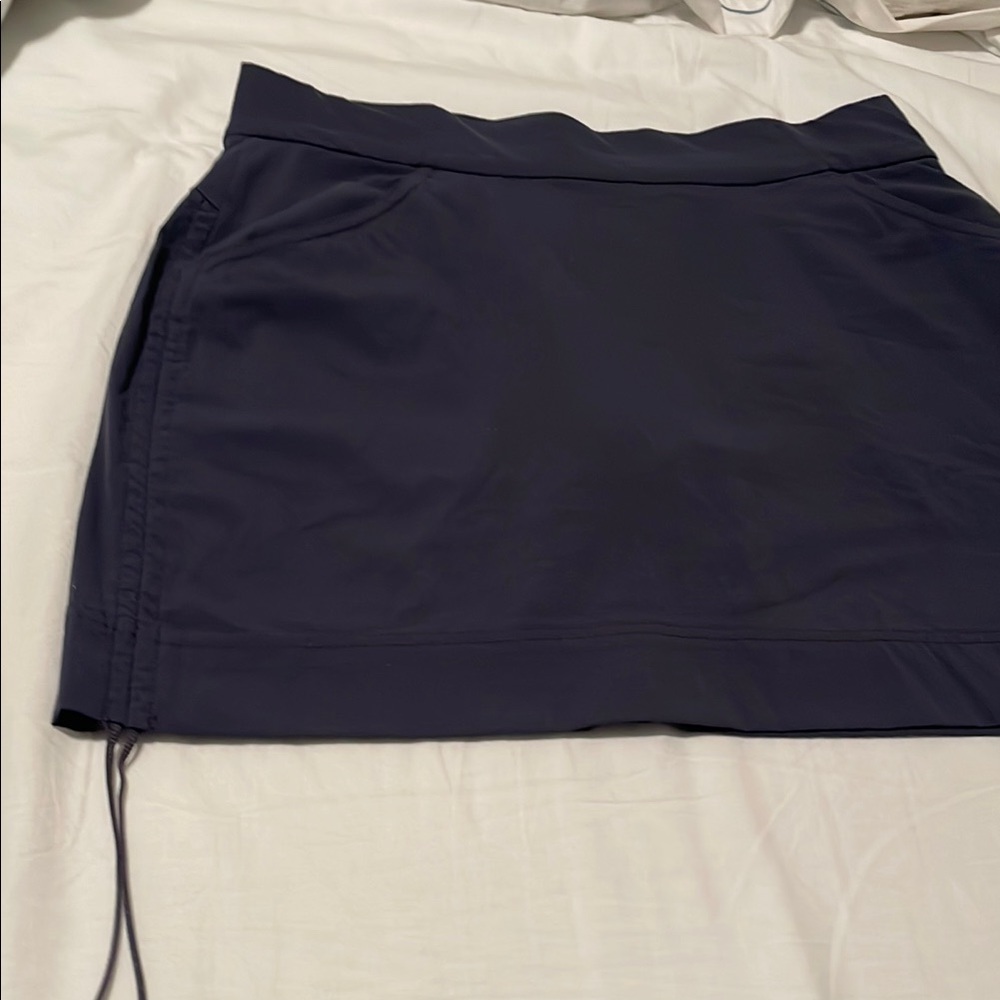 Price reduced
Columbia Dark Blue Skort with Adjustable Waist/ matching top